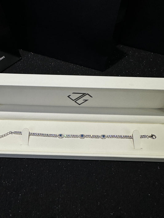 Pulso tennis plata ojos ajustable 16-20 cm