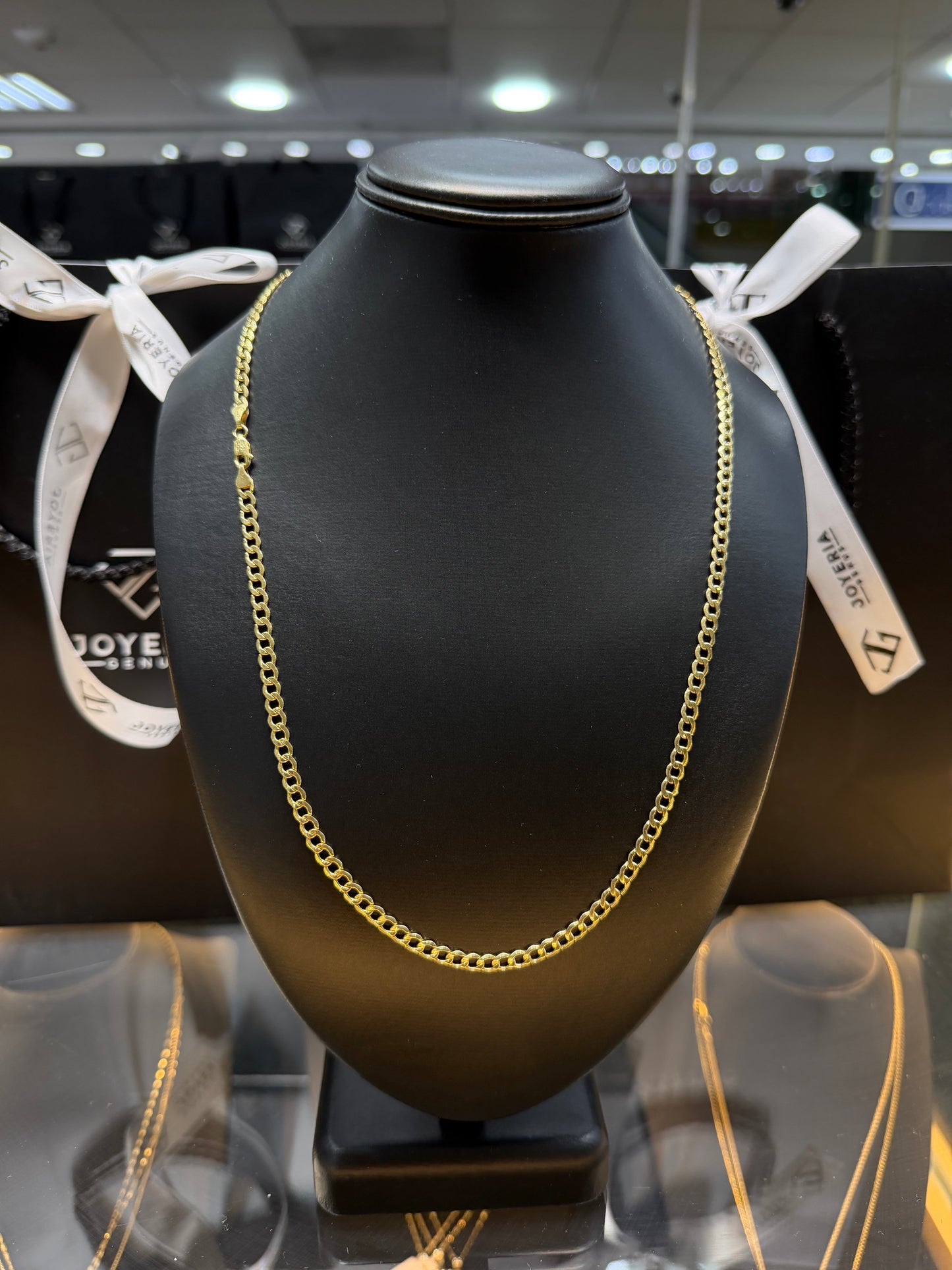 Cadena barbada oro 10 K 4 mm x 65 cm