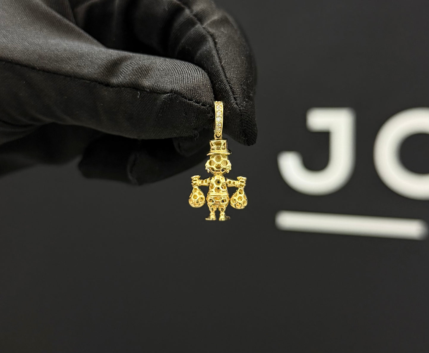 Dije McPato Oro 10k.