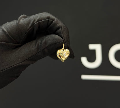 Dije corazón con piedra Oro 10k.