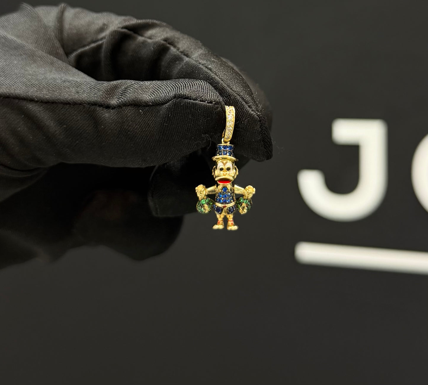 Dije McPato Oro 10k.