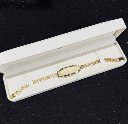 Esclava de petatillo con nombre 6.5 mm x 21 cm Oro 10k.