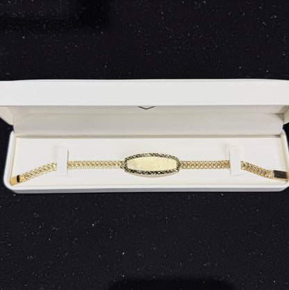 Esclava de petatillo con nombre 6.5 mm x 21 cm Oro 10k.